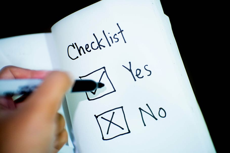 person, writing, notebook, checklist, check yes or no, decision, opinion, business, work, respond