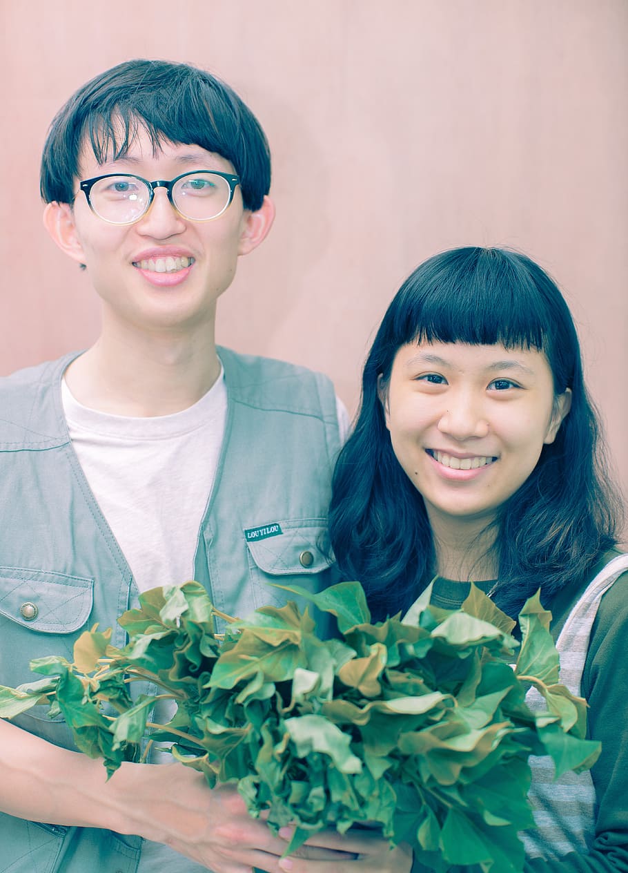 man, woman, holding, green, leaf plants, asian, couple, people, female, male