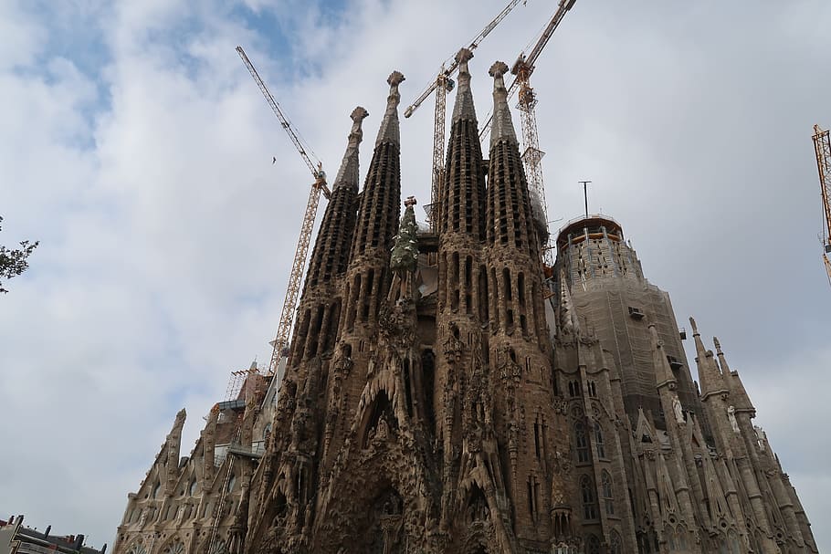 gaudi, barcelona, gaudi cathedral, the apartment emilia, la sagrada familia, sky, built structure, architecture, low angle view, building exterior