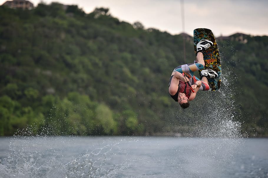 man wakeboarding, water, action, adult, blur, blurry, boy, facial expression, focus, fun