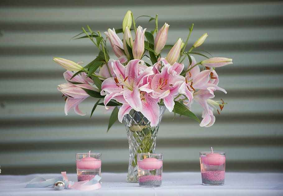 pink, petaled flowers, clear, vase, three, candle holders, lillies, lily, flowers, floral