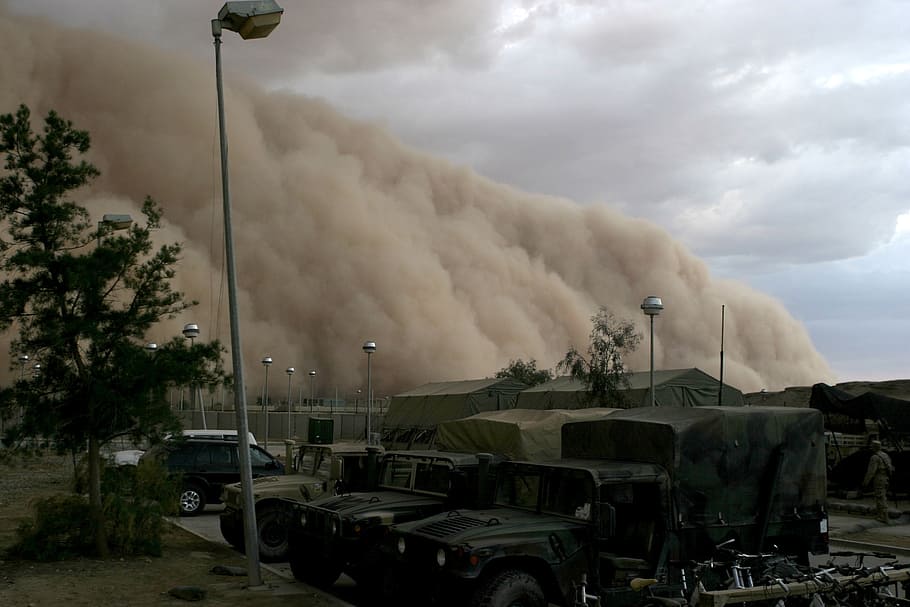 large, brown, smoke, military, camp, dayime, sandstorm, military camp, desert, forward