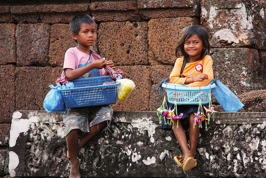 two, boy, girl, sitting, concrete, wall, carrying, basket, goods, local