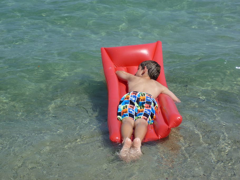 boy, lying, red, floater, daytime, air mattress, children, water, floating body, sea