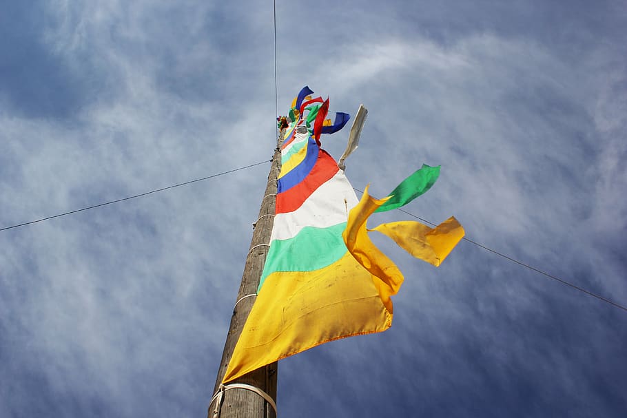 prayer flags, sky, tibetan, low angle view, flag, cloud - sky, patriotism, multi colored, yellow, nature