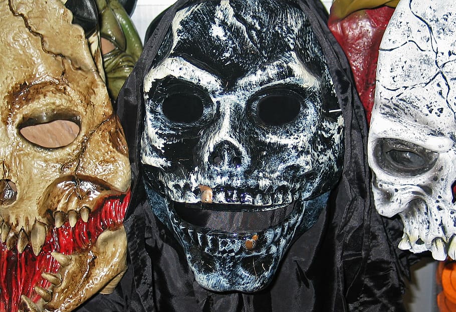 three, brown, black, white, skullhead vinyl masks, halloween, shudder, spooky, weird, surreal
