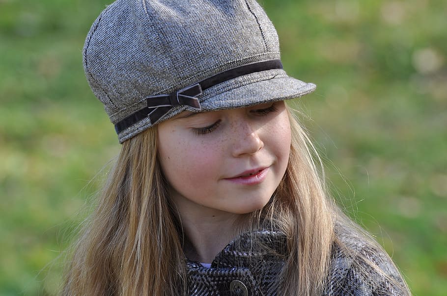 close-up photography, girl, wearing, grey, coat, cap, daytime, child, face, view
