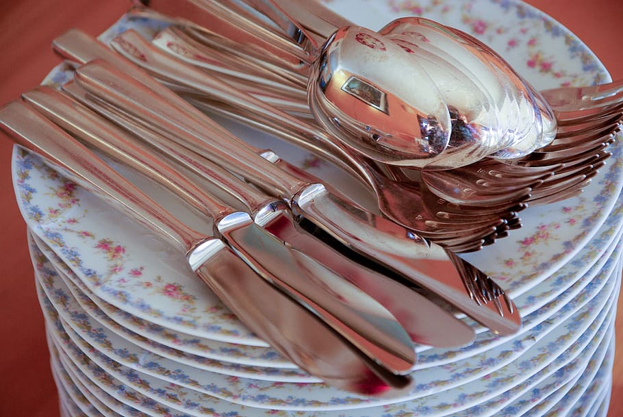 plates, knives, forks, spoons, silverware, crockery, plate, indoors, close-up, high angle view
