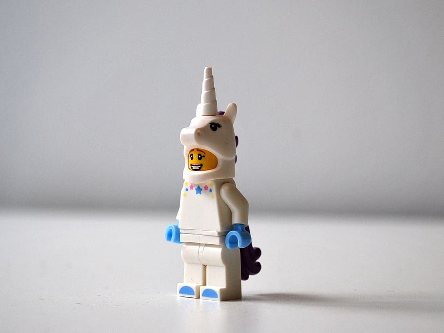 white, blue, unicorn lego mini figure, lego, unicorn, toy, characters, representation, indoors, human representation