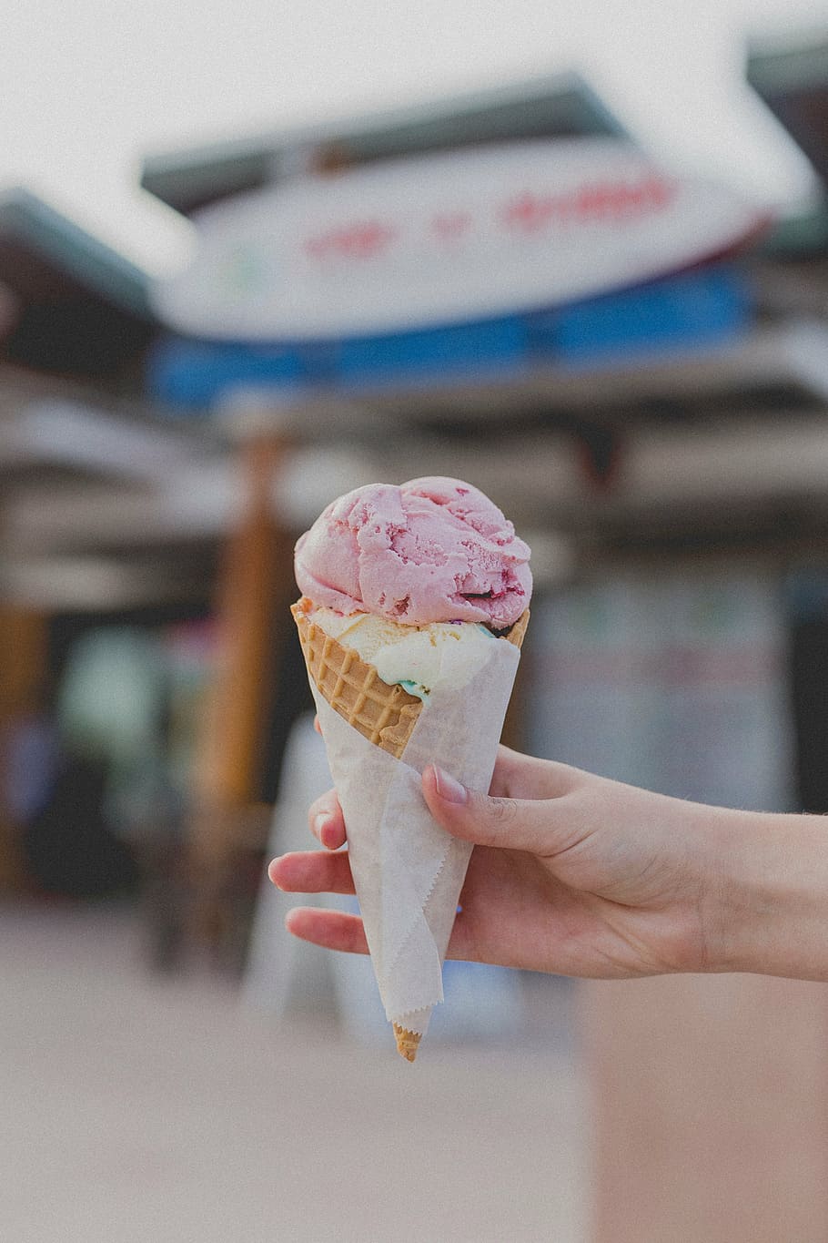 person, holding, strawberry ice cream, cone, ice, cream, dessert, sweet, food, frozen