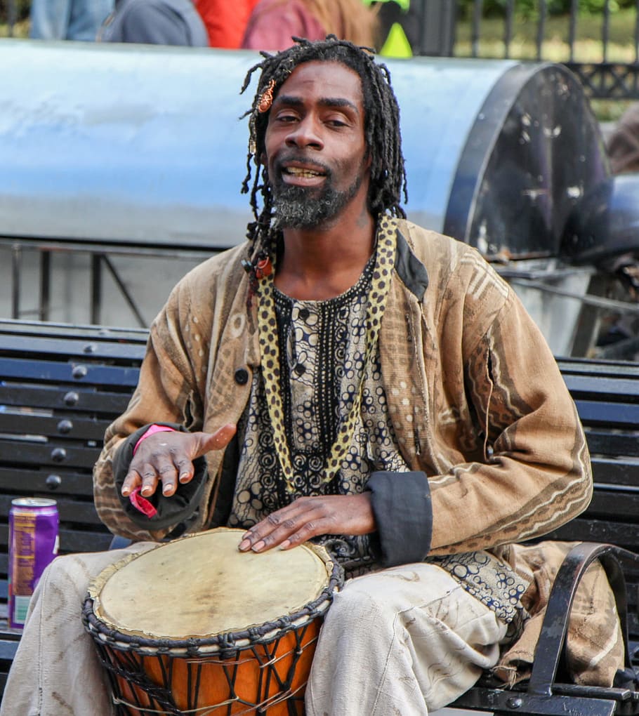 people, musician, new orleans, one person, music, musical instrument, sitting, musical equipment, arts culture and entertainment, looking at camera