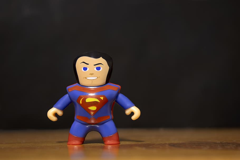 superman, comic, super hero, plastic, toy, black background, indoors, representation, human representation, front view