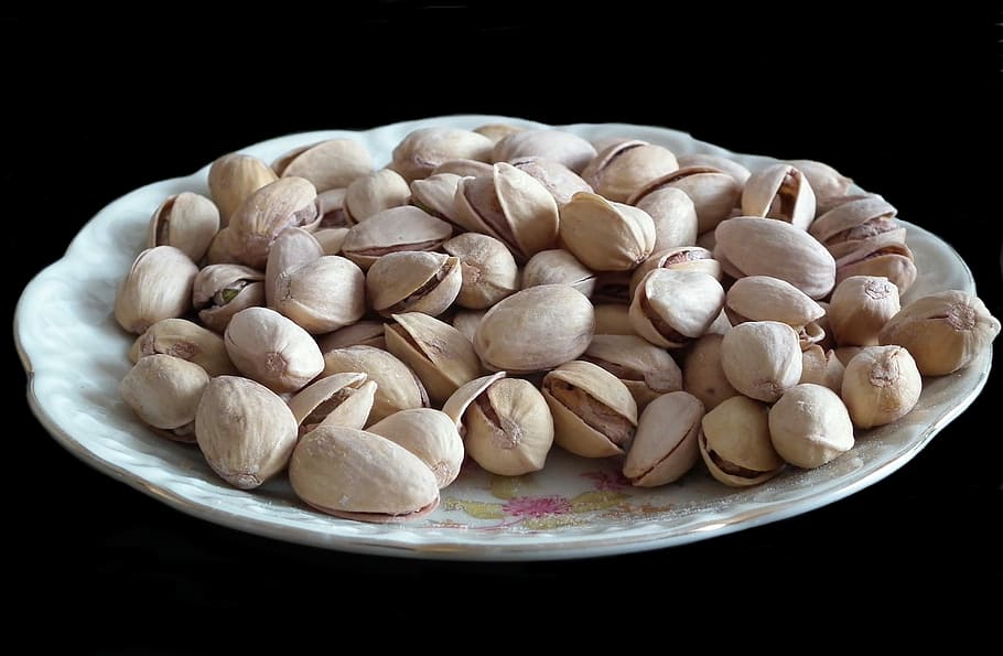 eating, pistachios, healthy, plate, nutritionist, food and drink, food, freshness, black background, wellbeing