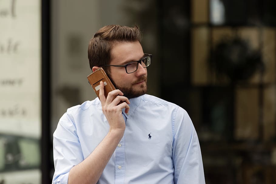 man, young, the person, male, adult, glasses, speaking, conversation, phone, street