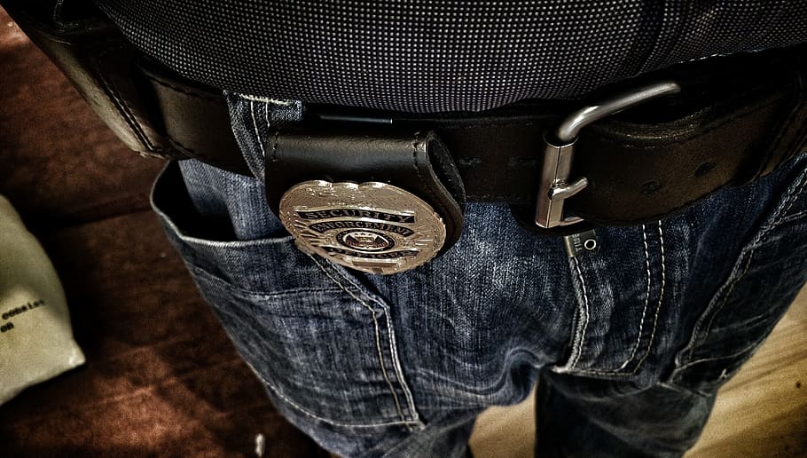 guard, belt, badge, jeans, one person, midsection, casual clothing, human body part, denim, textile