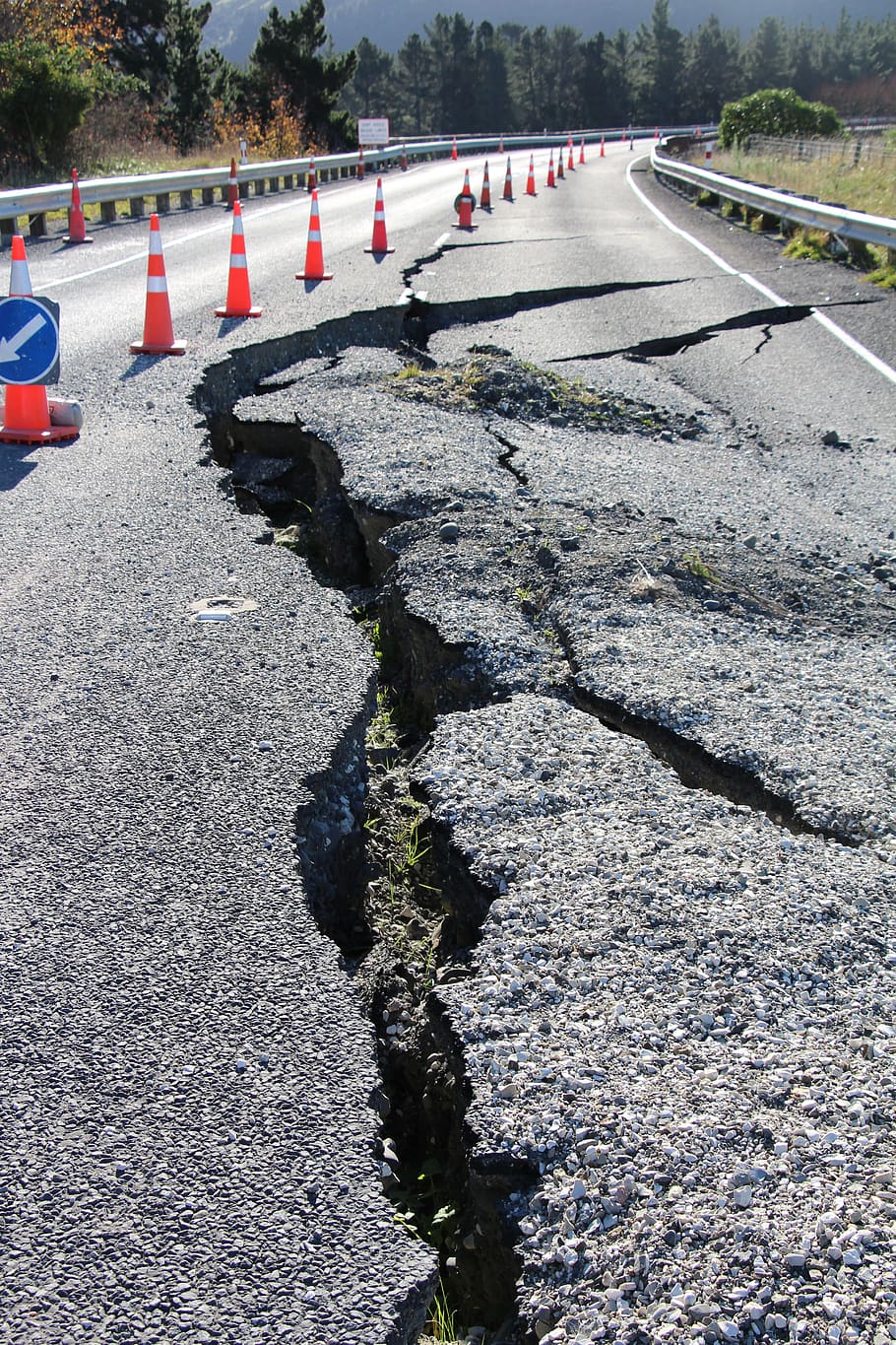 road, earthquake, damage, crack, repairs, broken, cracked, roadworks, cone, transportation