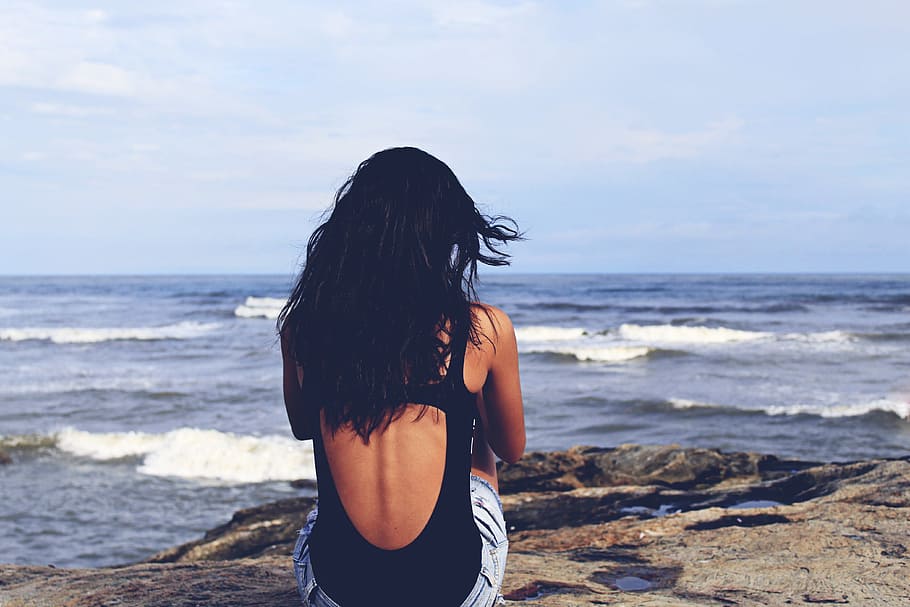 woman, sitting, rock formation, body, water, mar, beach, body of water, ocean, girl