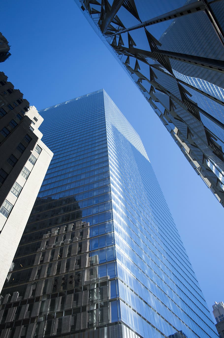 fotografia em ângulo baixo, vidro, alto, prédio alto, centro de comércio mundial, negócios, internacional, comércio, economia, azul