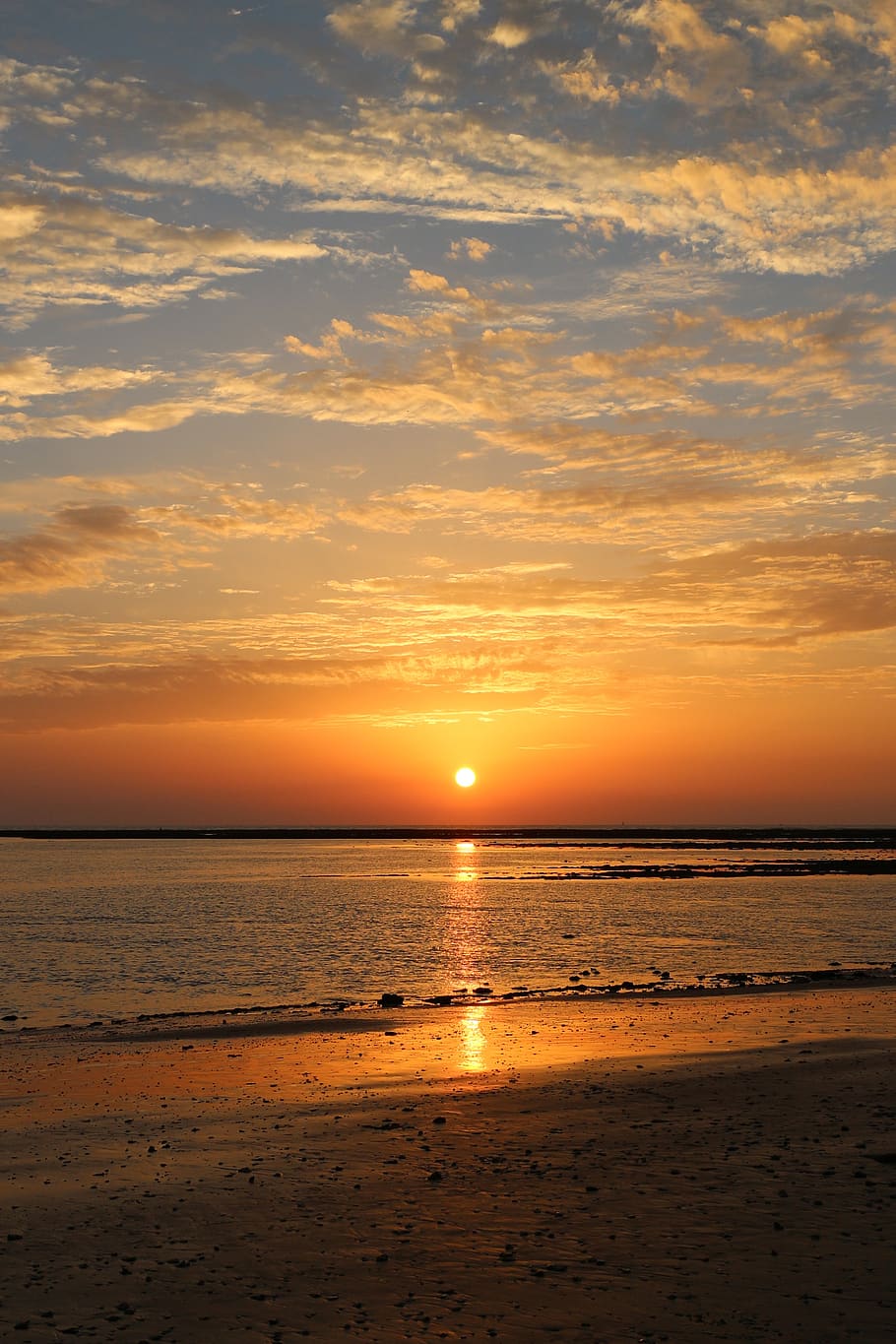 sunset, sea, ray of sunshine, beach, sun, sand, water, the light of the sun, holiday, landscape