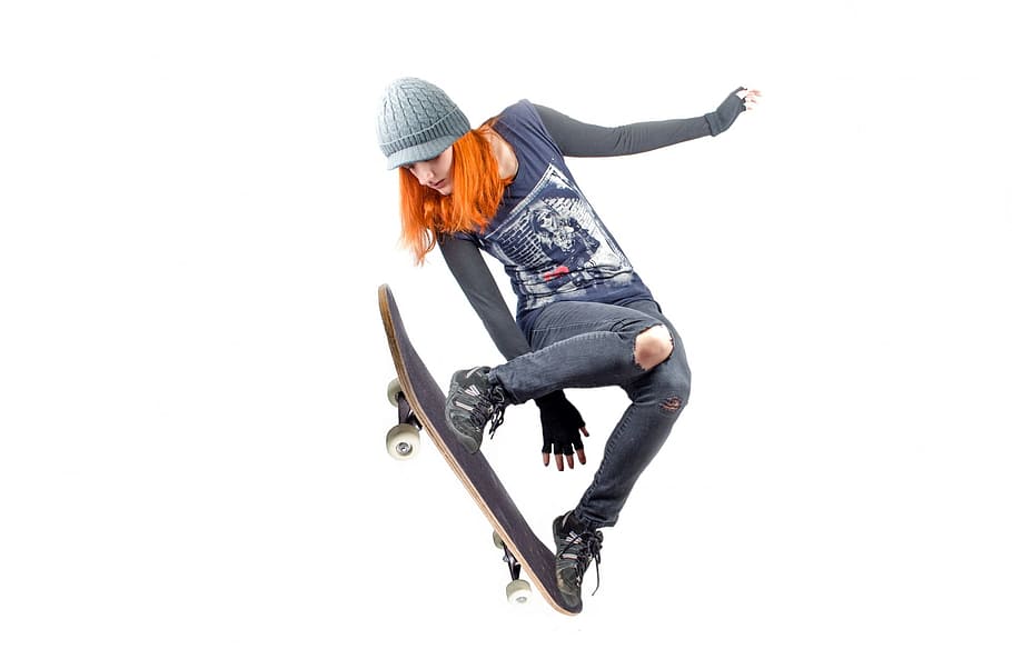 woman, black, long, sleeve shirt, pants, pair, shoes, jumping, skateboard, feet