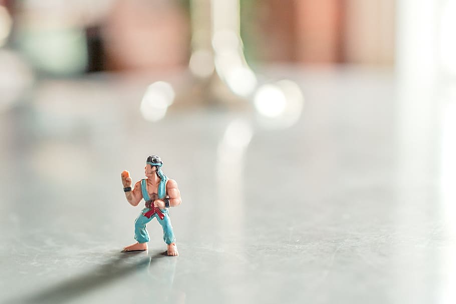 macro photography, fighter action gifure, warrior, karate, japanese, toy, soldier, rambo, small, tiny