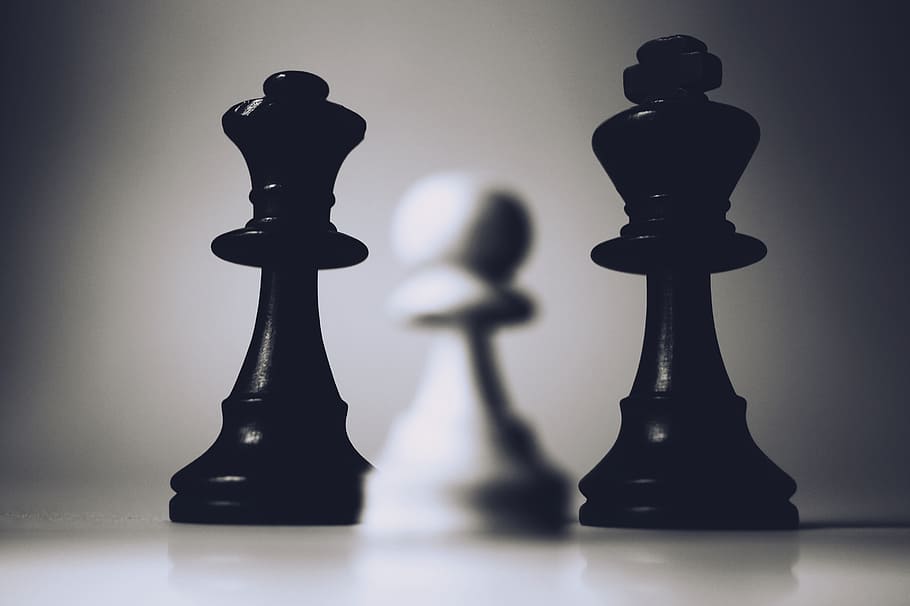 selective-focus photography, two, black, chess pieces, white, chess piece, blur, board game, challenge, chess