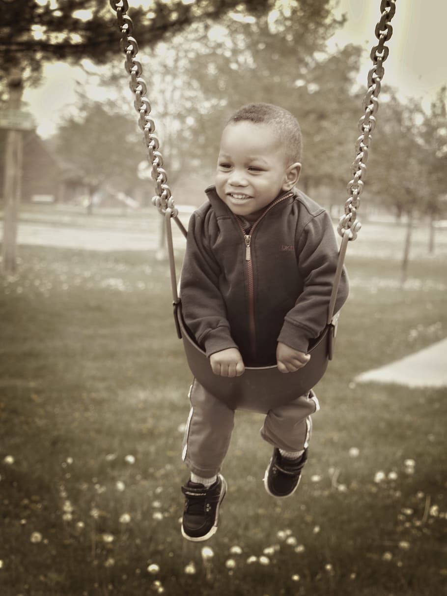 boy, young boy, Boy, young boy, young african american boy, toddler, kid, playground, swing, swinging, happy