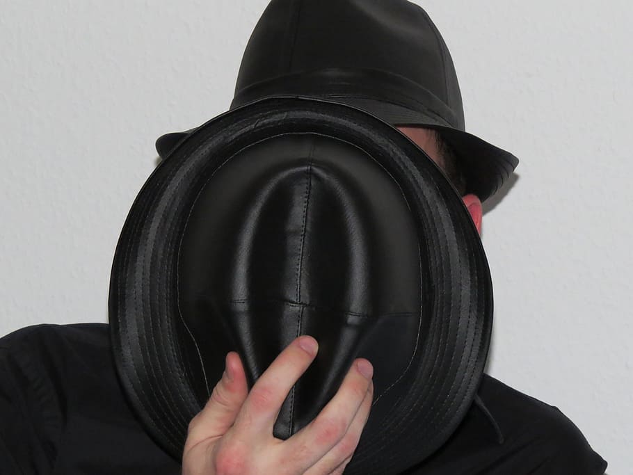 man, covering, face, hat, hats, person, hidden, leather, one person, black color