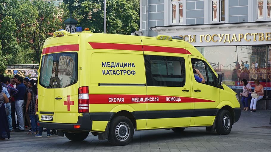 yellow, red, ambulance van, parked, road, car, medicine, health, medical, hospital