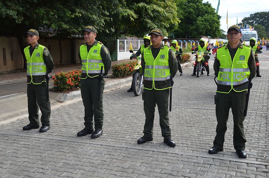 police, guards, group of people, real people, clothing, full length, reflective clothing, day, standing, men