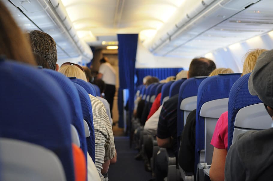 people, sitting, plane seats, airplane, on board, seats, travel, transportation, aisle, vehicle seat