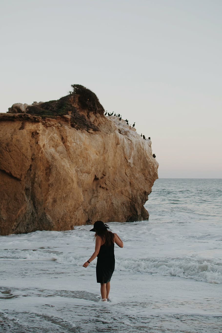 woman, standing, seashore, black, dress, beach, water, waves, girl, hat