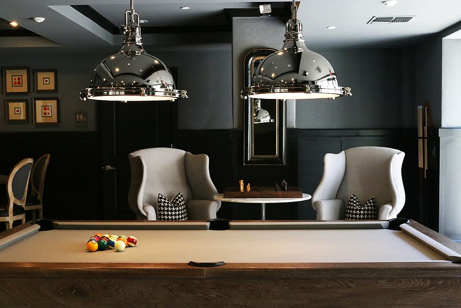 two, silver-colored pool lamp, brown, pool table, billiard table, chairs, furnitures, indoors, room, sofas
