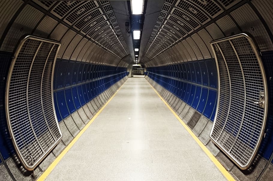 London tube, empty gray tunnel, architecture, the way forward, direction, built structure, indoors, transportation, lighting equipment, empty
