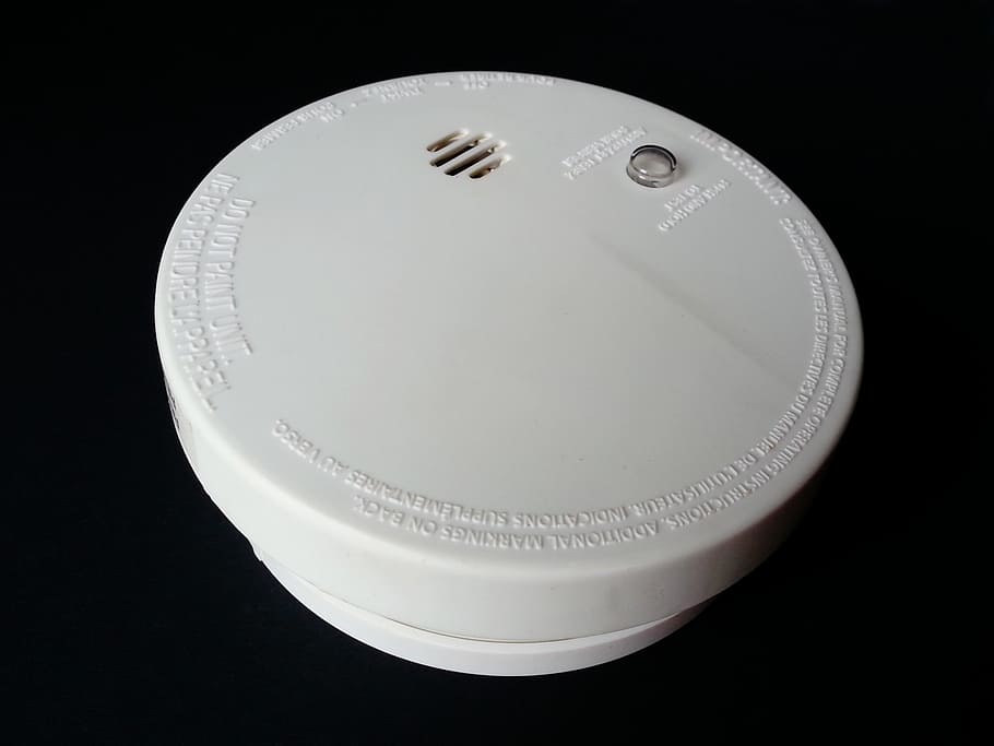 round, white, wireless, handheld, electronic, device, smoke, detector, fire, alarm