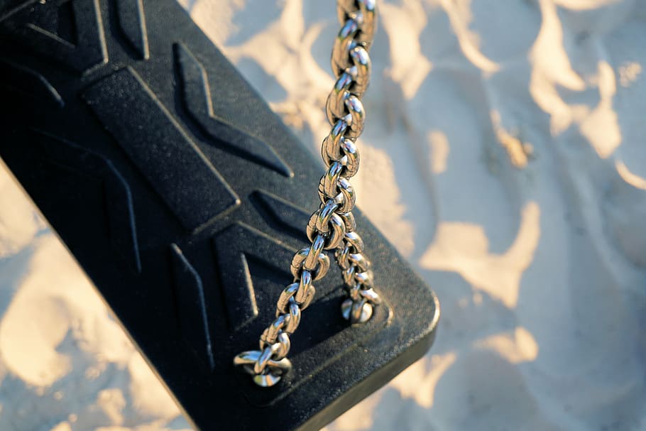 gray, metal chain, black, case, blue, white, surface, swing, sand, playground