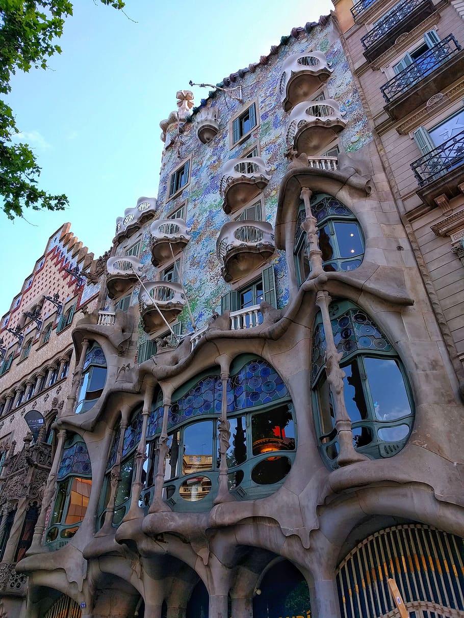 low-angle photo, brown, multicolored, multi-story building, daytime, casa batlló, barcelona, travel, europe, spain