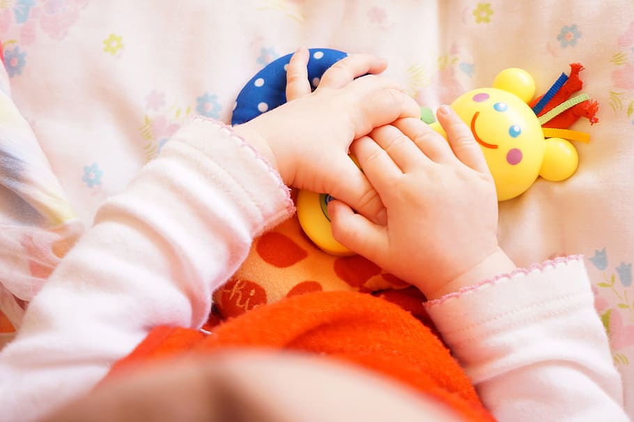 toddler, holding, yellow, toy, baby, hand, infant, plays, childhood, child