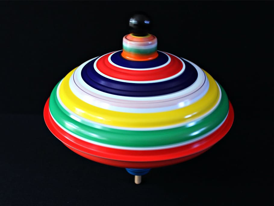 multicolored spin top, roundabout, movement, turn, colorful, color, tin toys, humming top, rotary centrifugal, toys