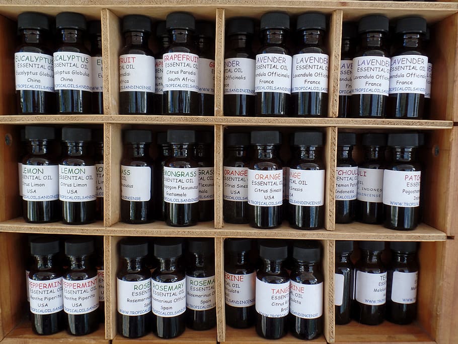 white, labeled, bottle lot, shelf, essential oil, oil, essential, market, herbal, health