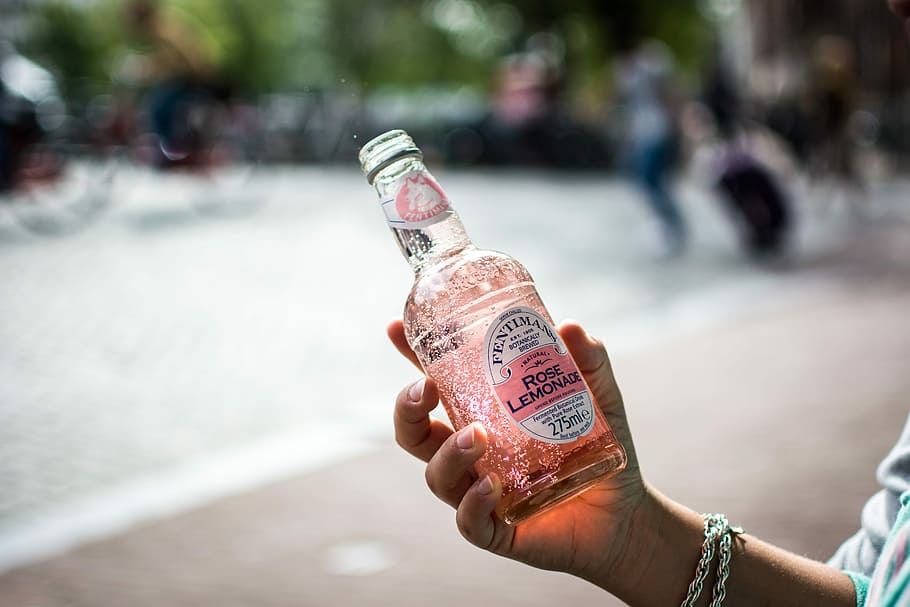 rose, lemonade, Amsterdam, drink, hands, outside, outdoors, people, street, editorial