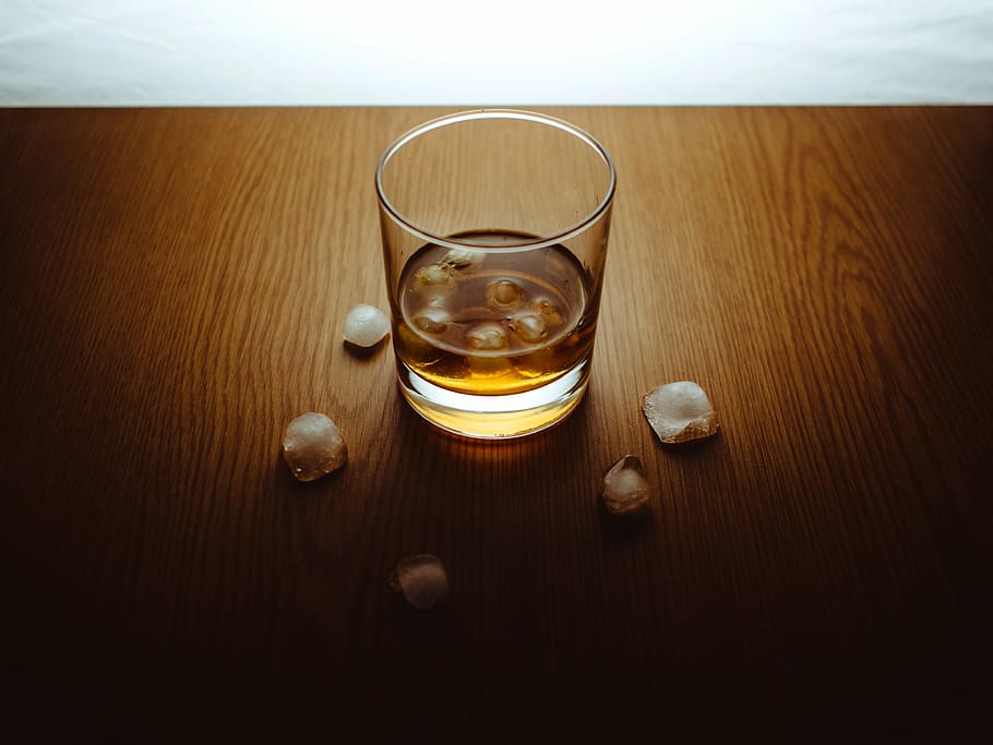 clear, drinking glass, brown, surface, drinking, glass, whisky, content, ice, cubes