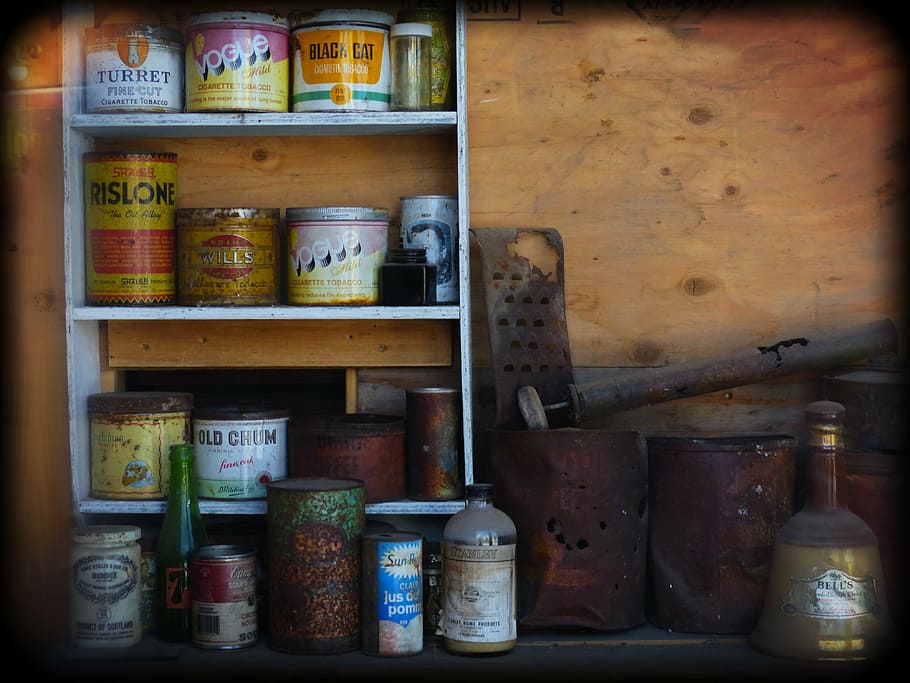 assorted-color, lot, table, metal cans, grocery, holga, deadman, ranch, ancient, buildings
