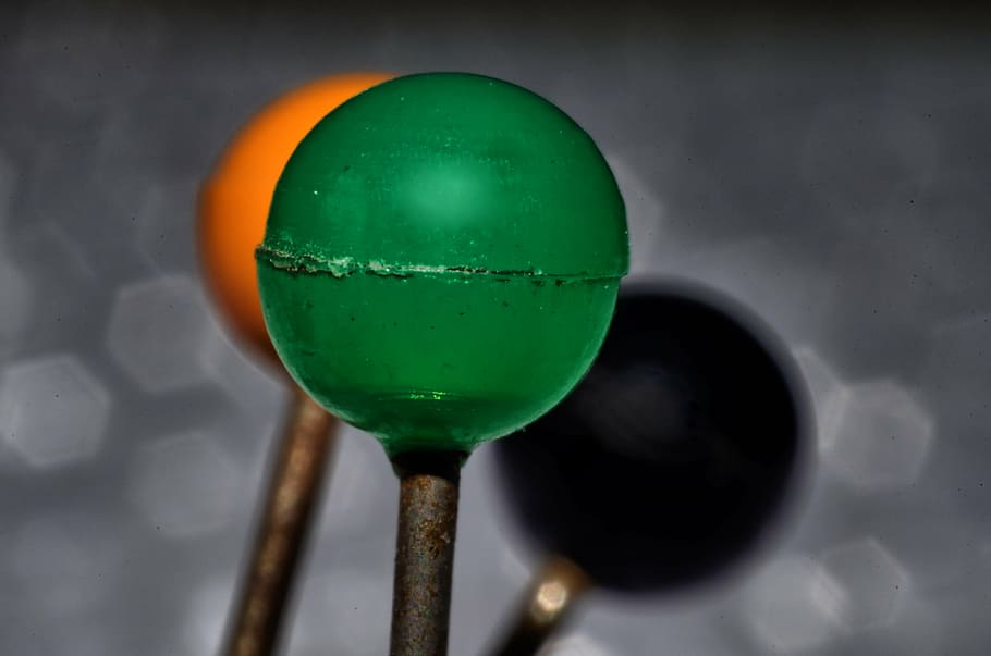 pin, pinhead, macro, needle, sphere, close-up, green color, multi colored, indoors, studio shot