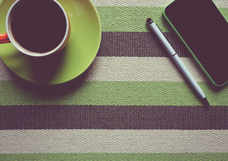 flat-lay photography, teacup, iphone, pen, striped, table, green, c, near, rectactable