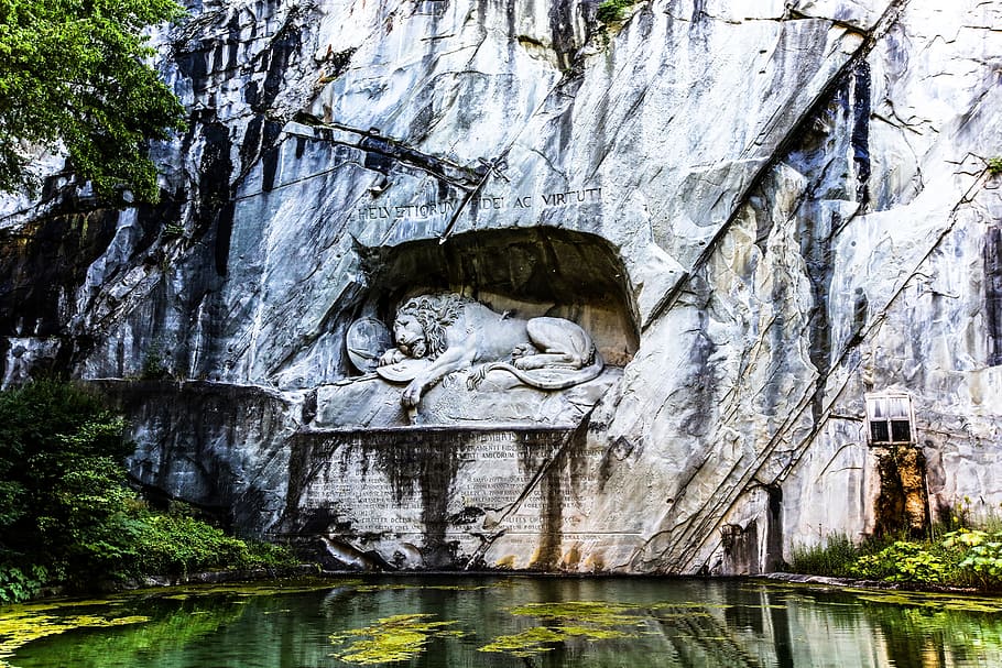 lion statue, white, wall, swiss, lucerne, empty of lion, solid, water, day, rock formation