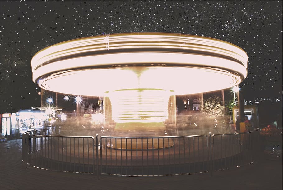 gray, metal fence, building, time, lapse, carousel, nighttime, amusement park, ride, spinning