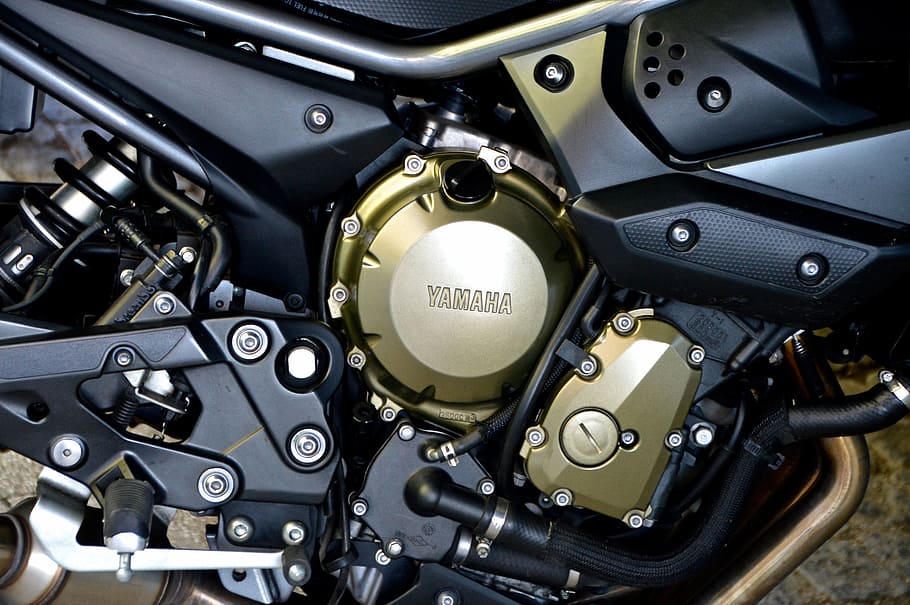 black, brown, yamaha motorcycle engine, close-up photo, yamaha, motorcycle, motor, screw, view details, embossing