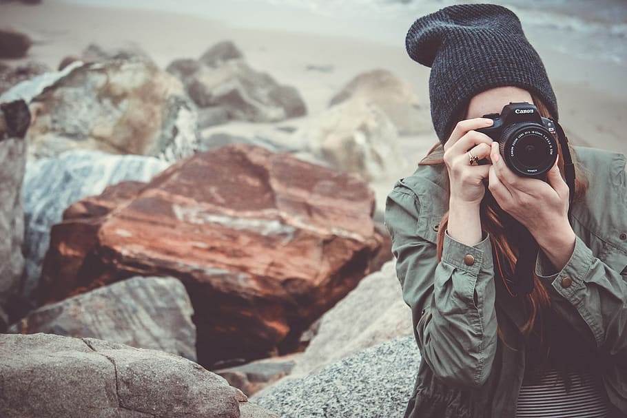 beach, camera, canon, dslr, girl, outdoors, person, picture taking, rocks, stones