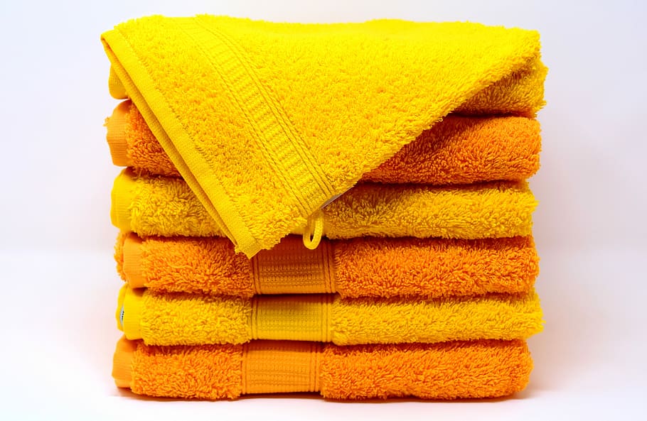close-up photo, textiles, towels, washcloth, yellow, orange, colorful, structure, color, soft